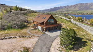 View of subject property with a mountainous background