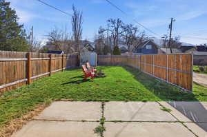 View of fenced backyard