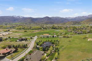 Aerial view of residential area with a mountain backdrop