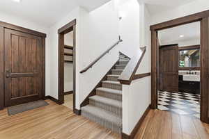 Entrance foyer featuring recessed lighting and light wood finished floors