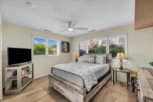 Bedroom featuring light wood-style floors and ceiling fan