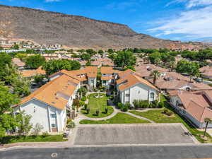 Aerial view of residential area with a mountainous background