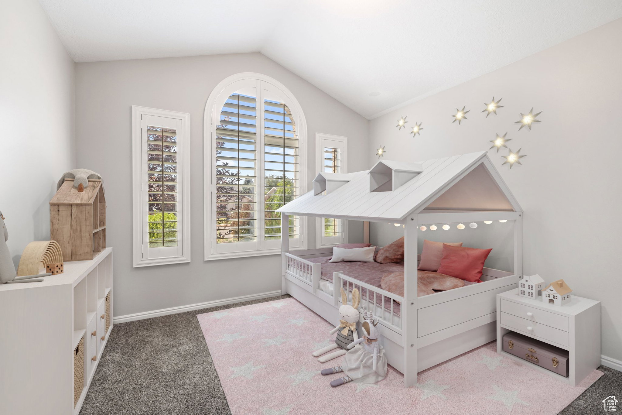 Carpeted bedroom with baseboards