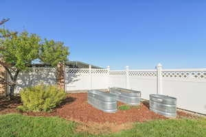 View of fenced backyard