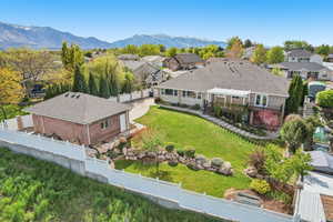 Aerial view of residential area featuring mountains