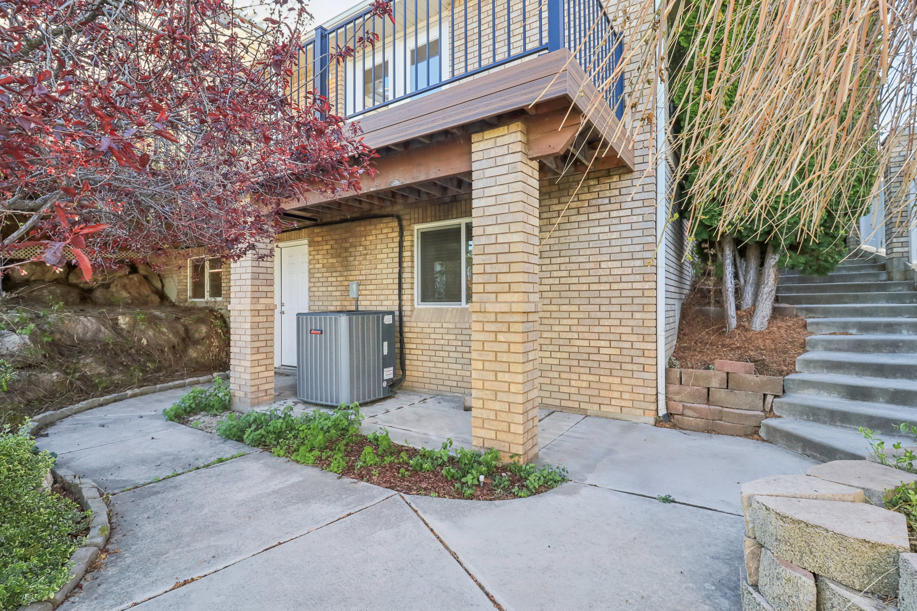 Entrance to property with brick siding