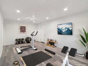 Workout area featuring recessed lighting