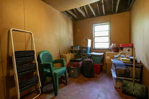 Miscellaneous room featuring concrete floors and heating unit