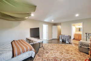 Bedroom featuring recessed lighting and baseboards
