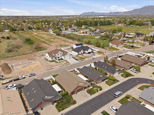 View of property location featuring nearby suburban area and mountains