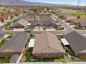 Aerial perspective of suburban area with a mountain backdrop