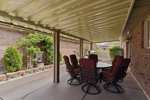 View of patio with outdoor dining space