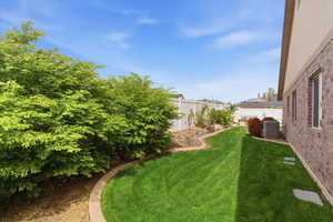 View of fenced backyard