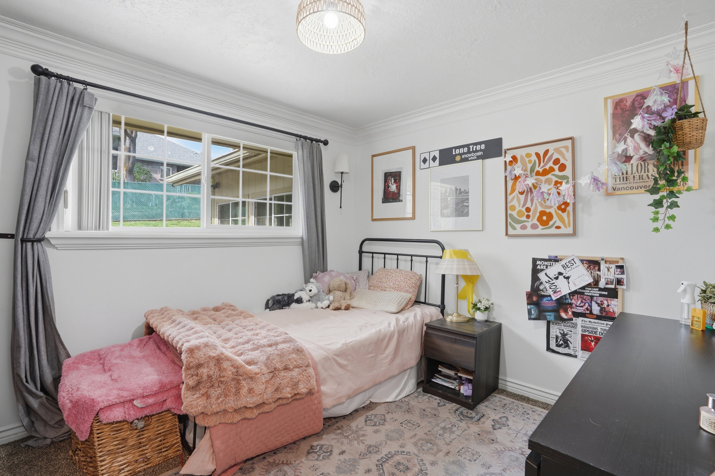 Bedroom with baseboards and ornamental molding