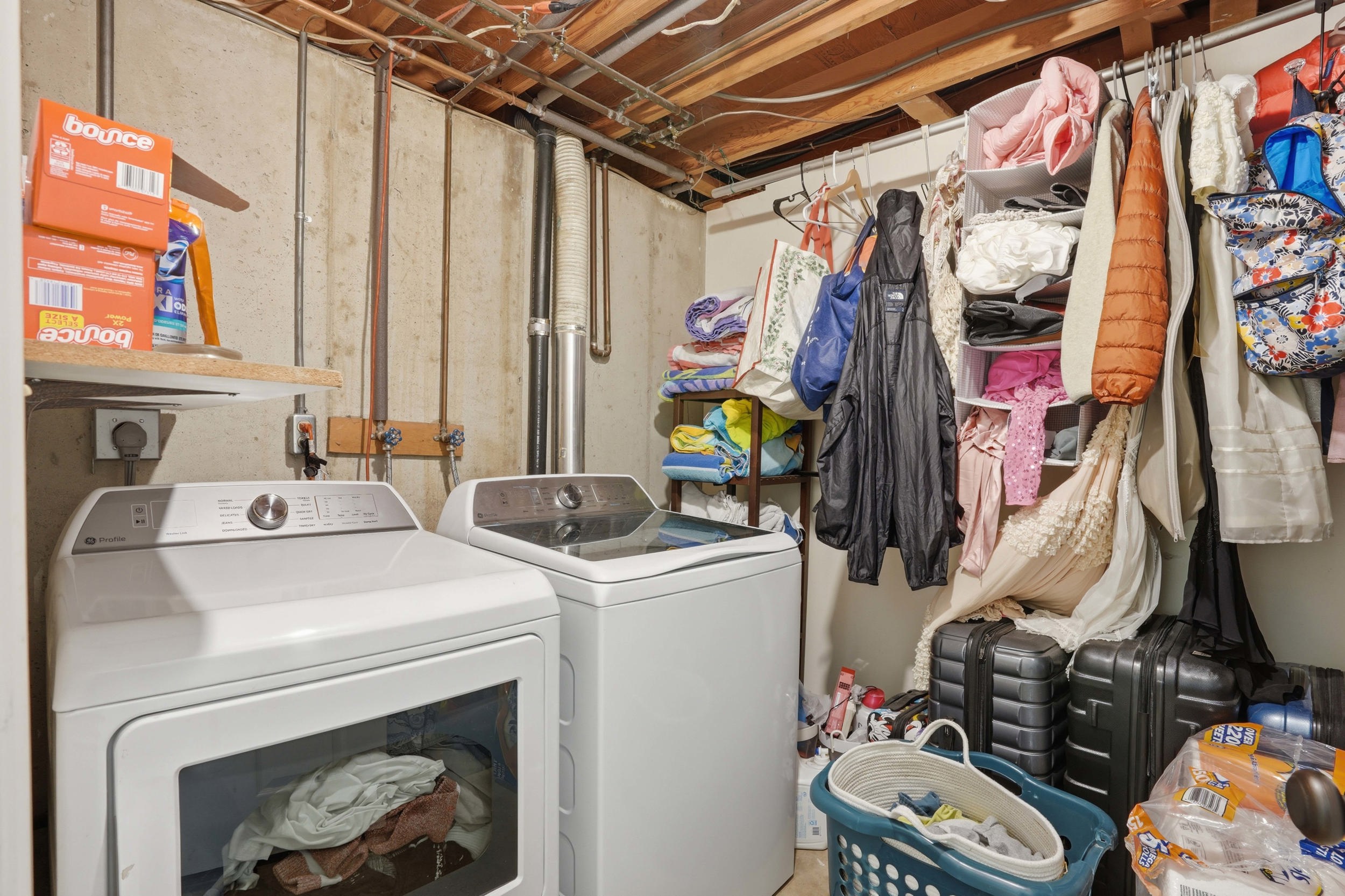 Laundry area featuring independent washer and dryer