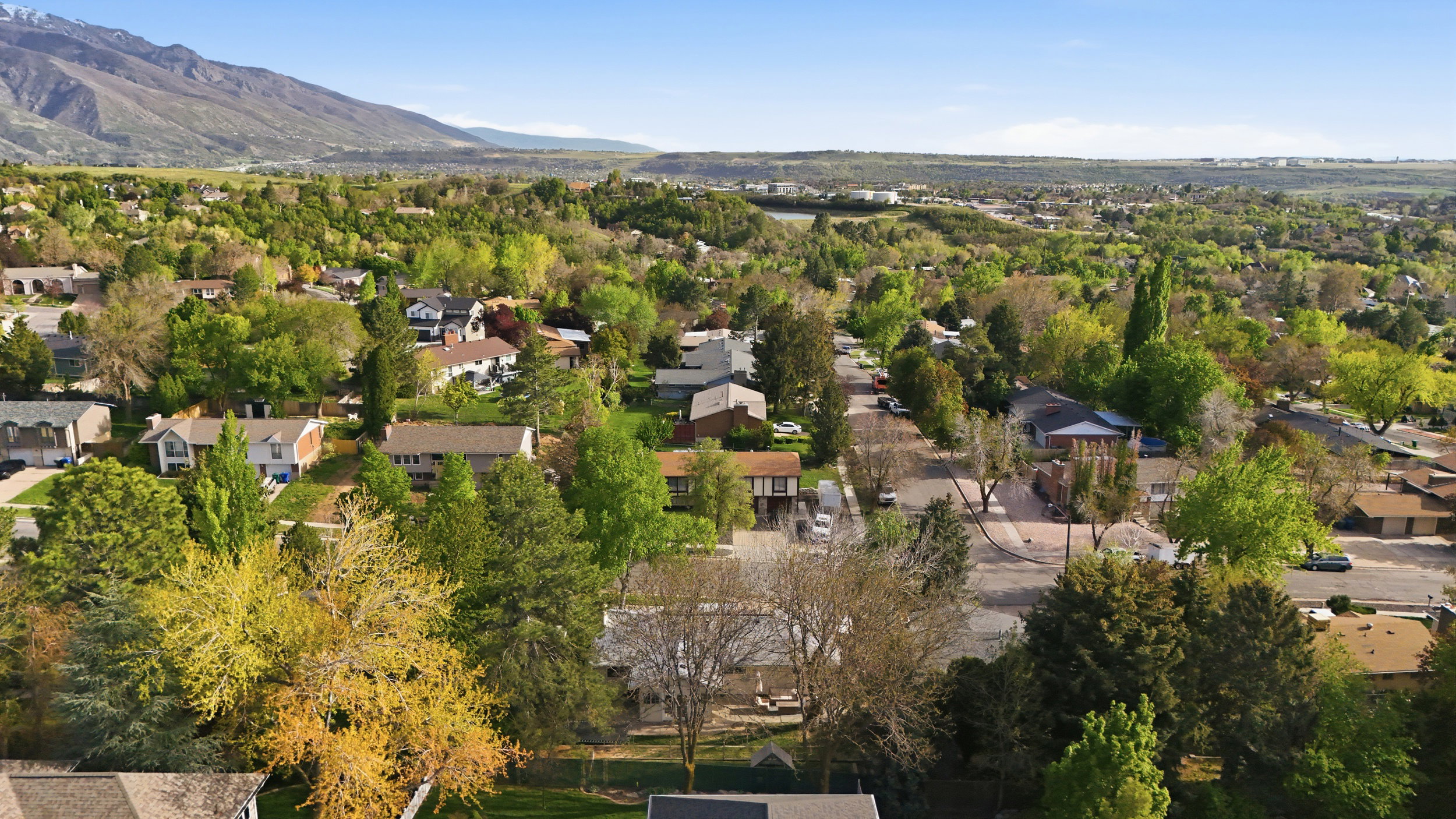 Aerial perspective of suburban area with mountains