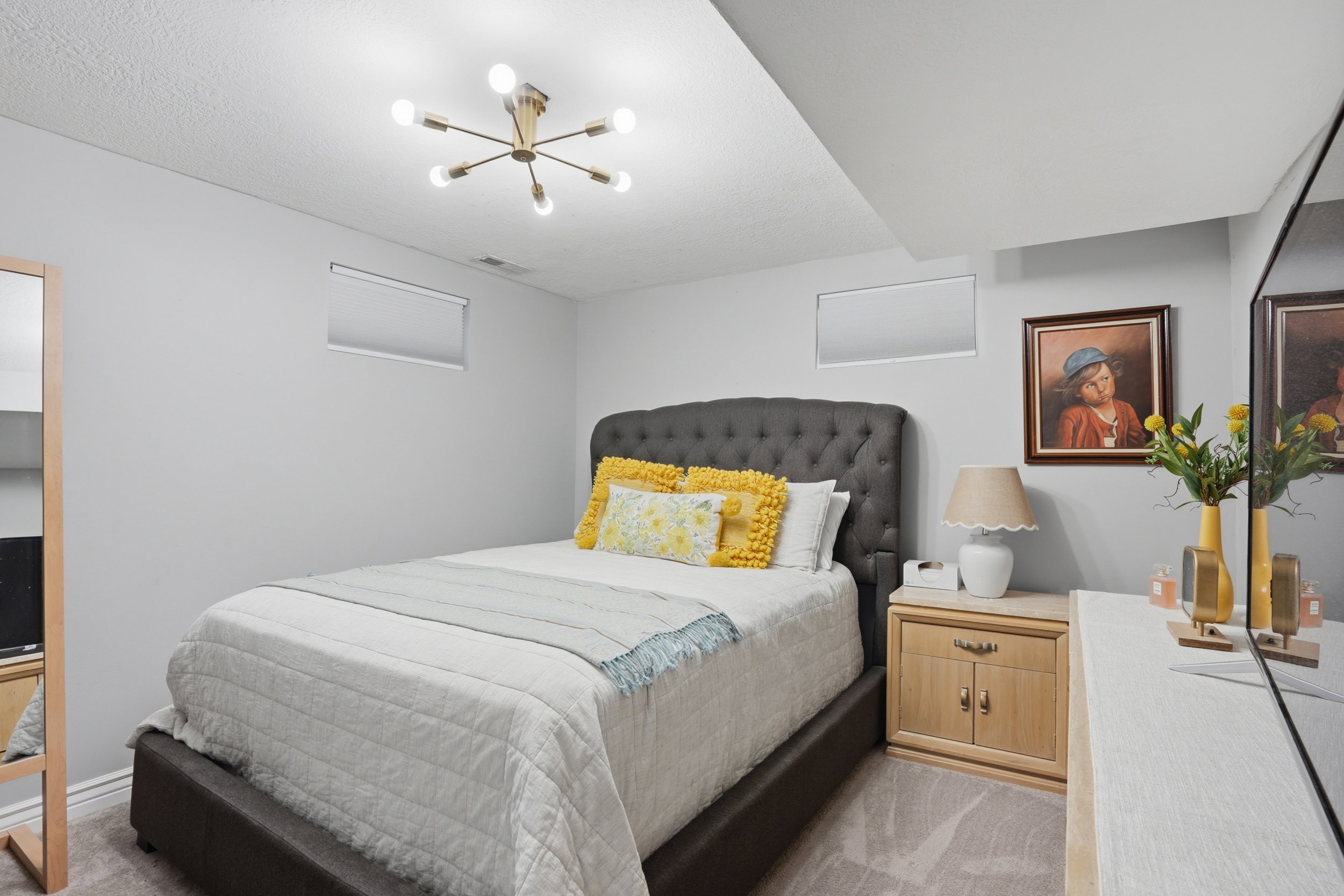 Bedroom with light carpet