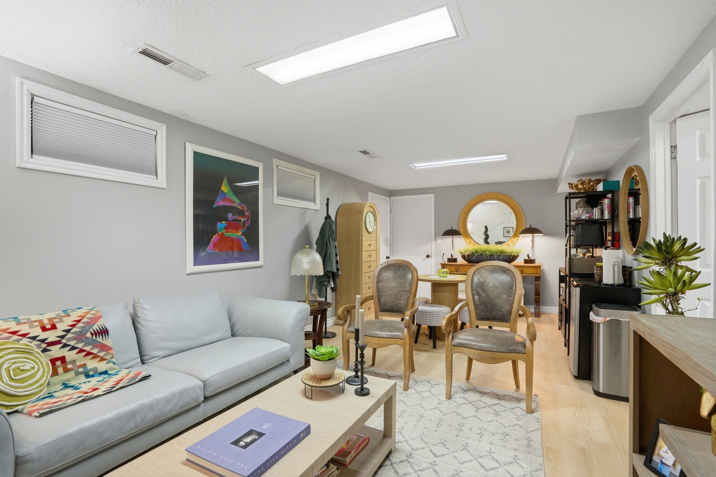 Living room with light wood-style flooring