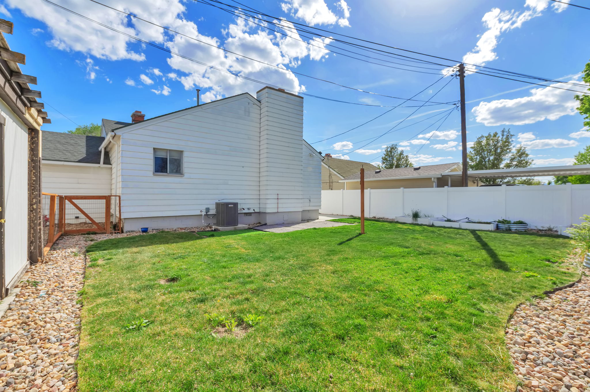 View of fenced backyard