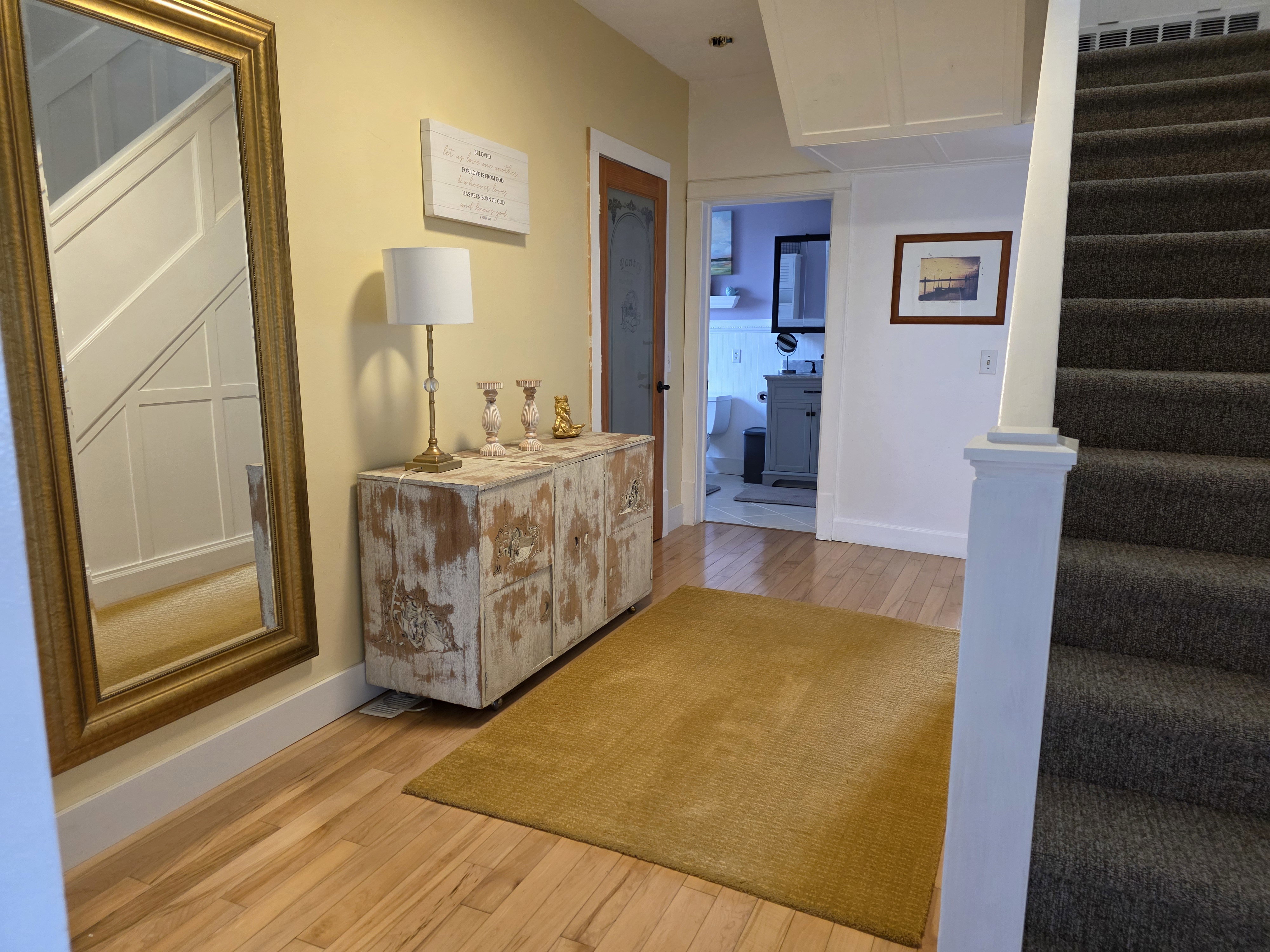 Hall featuring light wood-style flooring