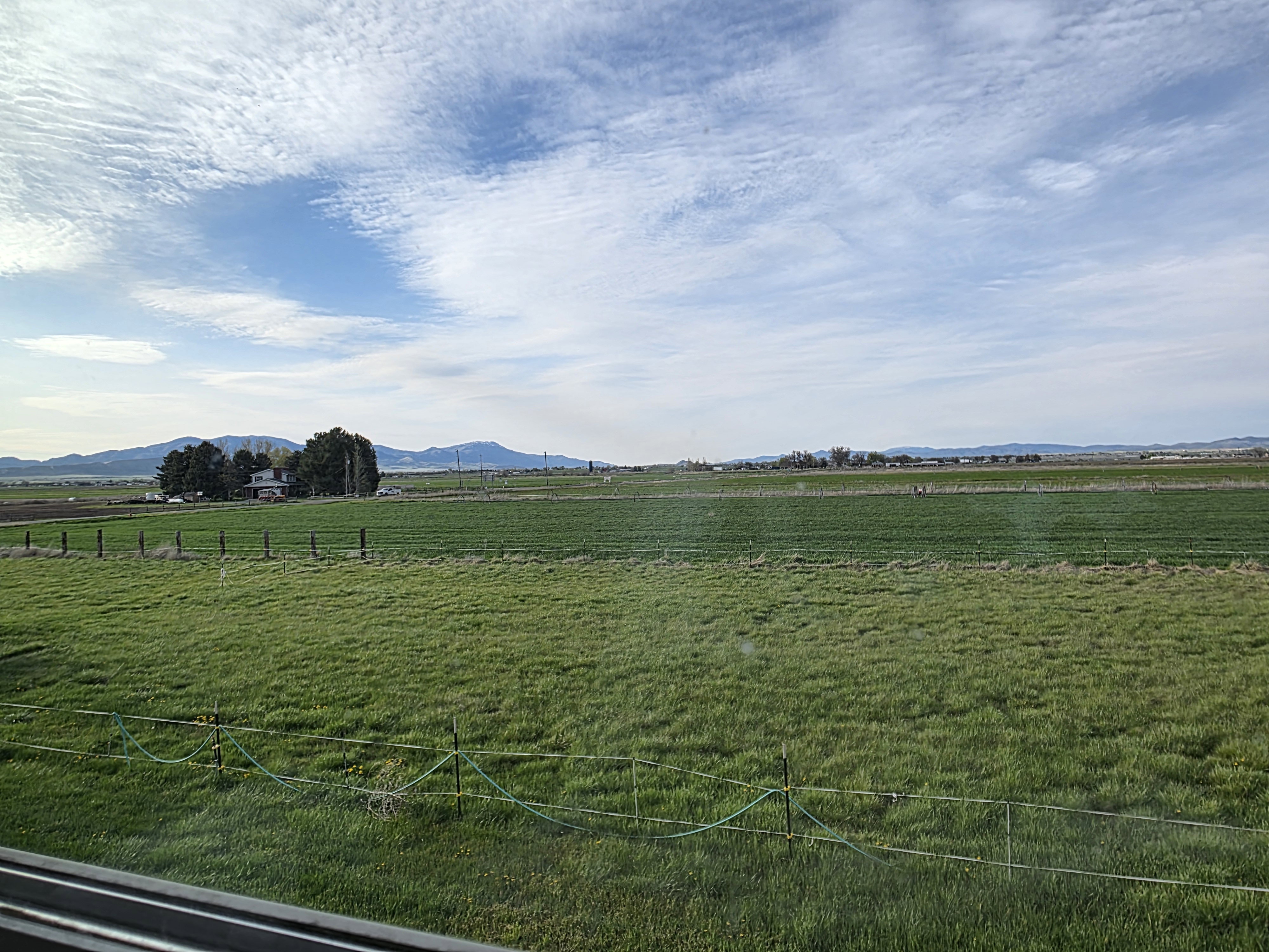 View of yard featuring a rural view and a mountain view