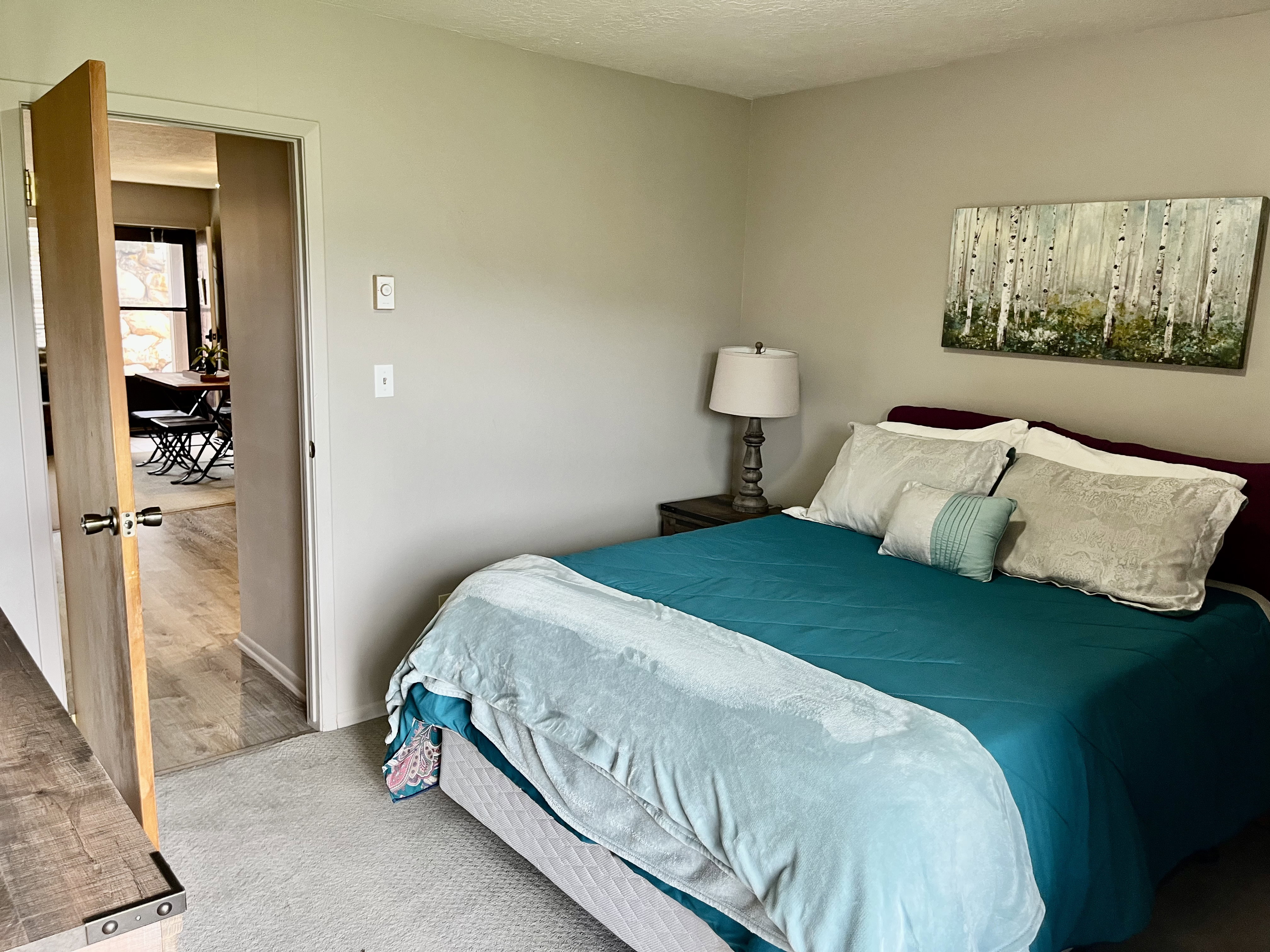 Main level Bedroom with Covered Deck