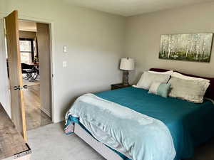 Main level Bedroom with Covered Deck