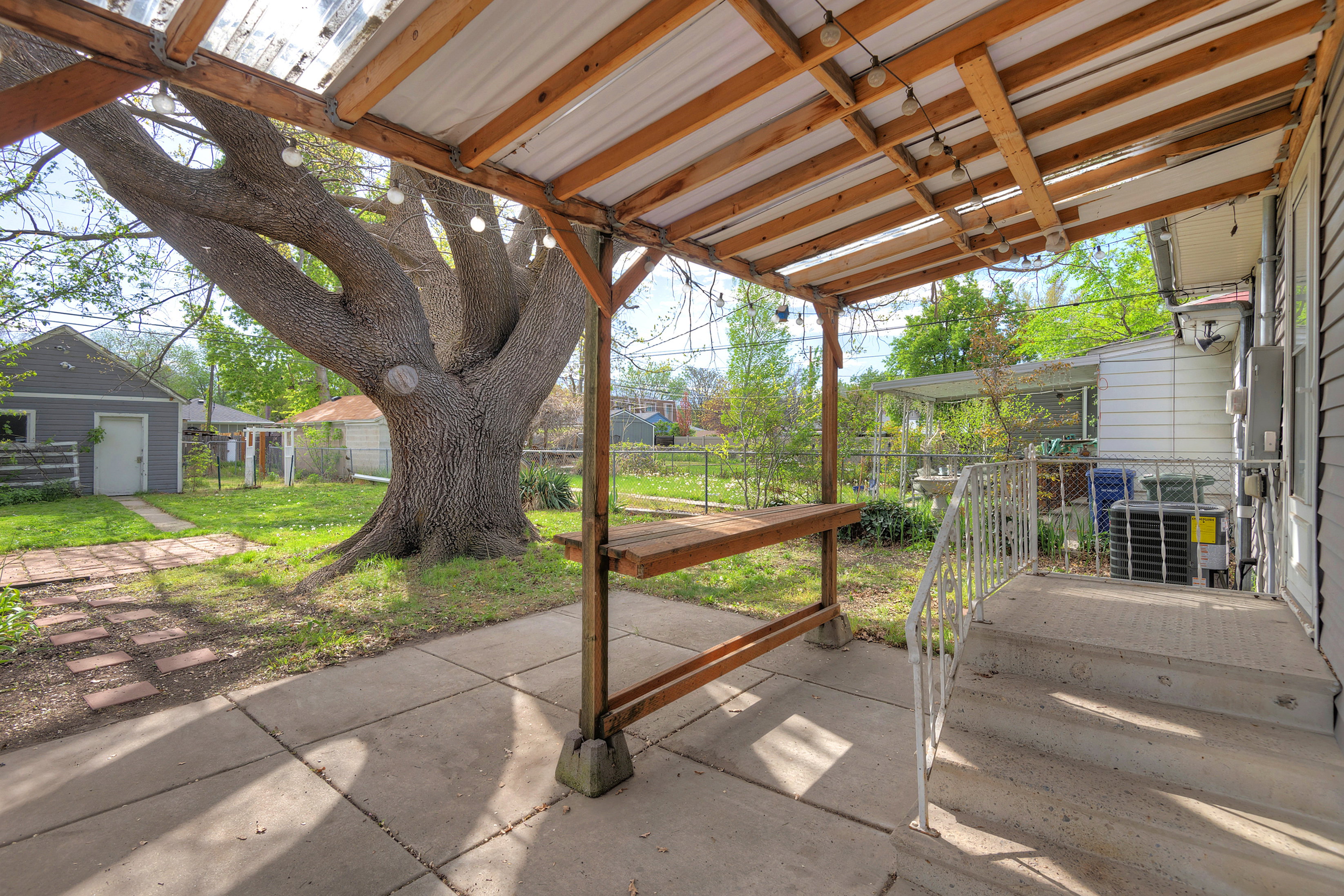 Fenced backyard featuring a patio