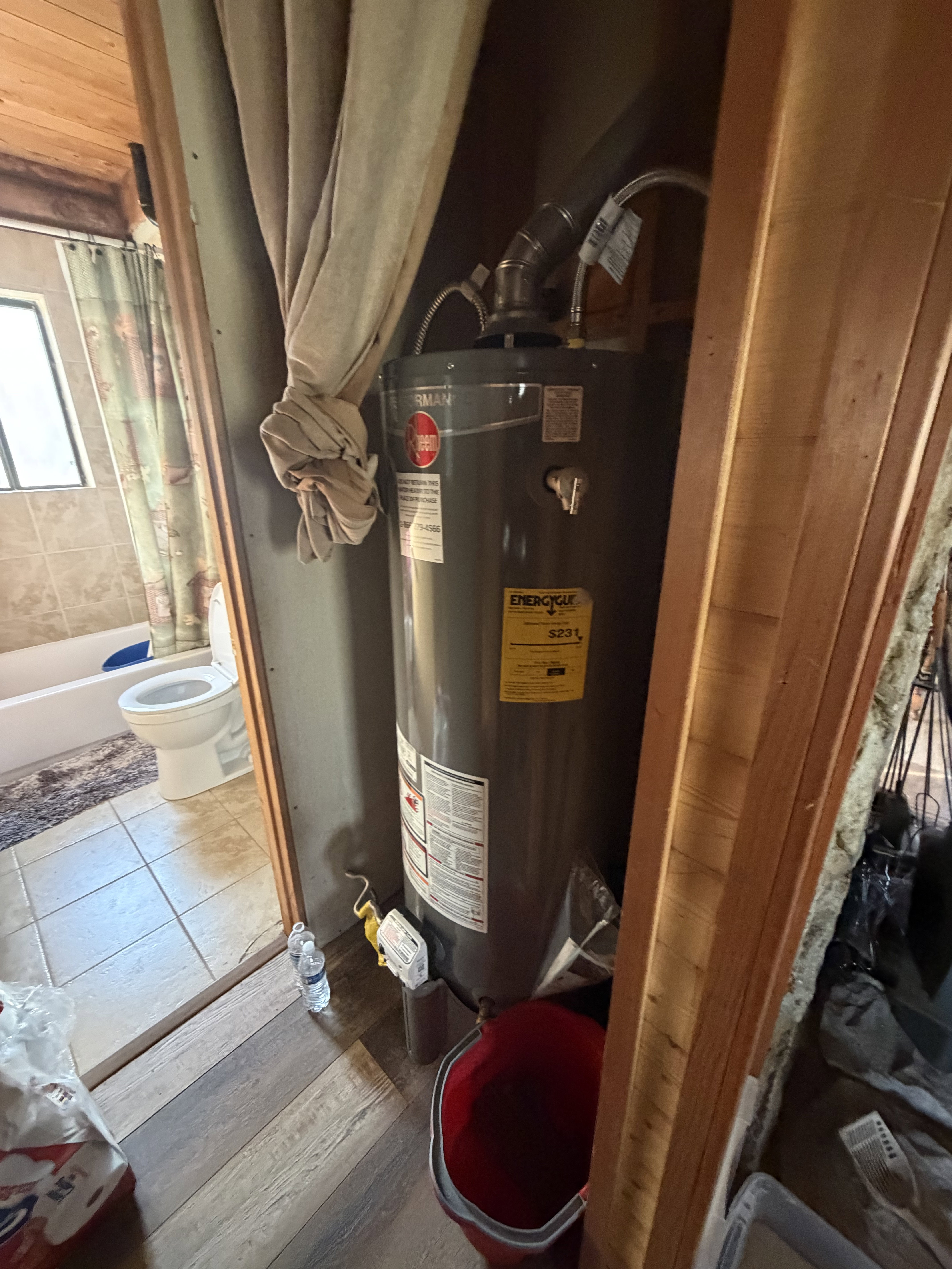 Utilities featuring gas water heater