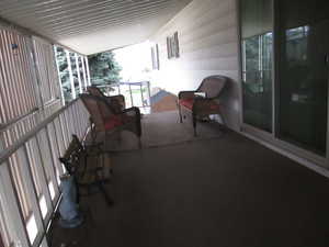 Sunroom / solarium with healthy amount of natural light