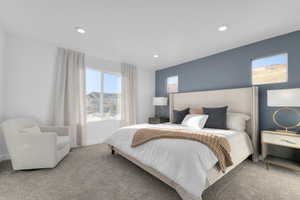 Carpeted bedroom featuring baseboards and recessed lighting