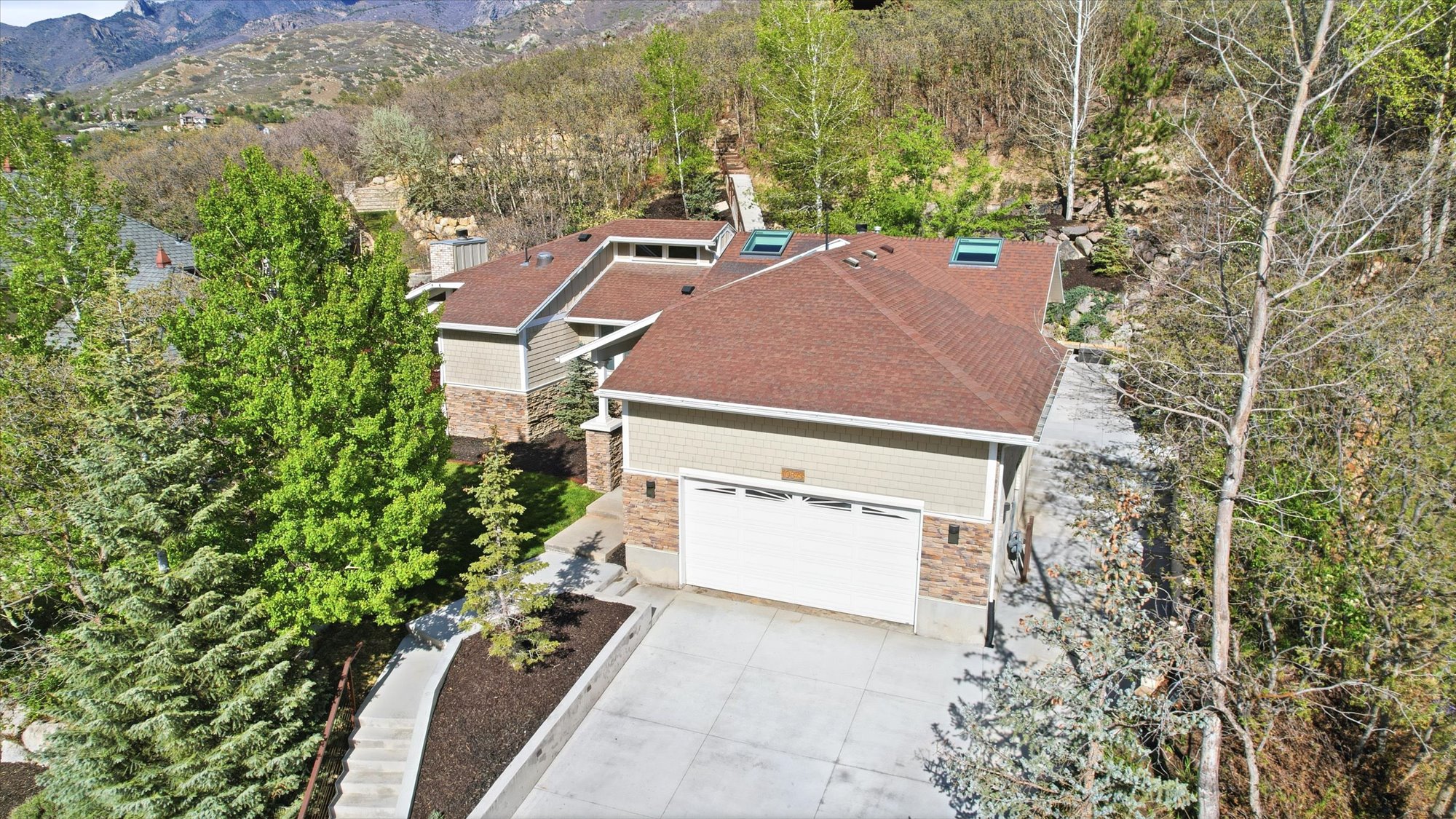 View of subject property featuring a mountain backdrop