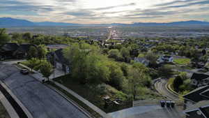 Aerial view of residential area featuring a mountainous background