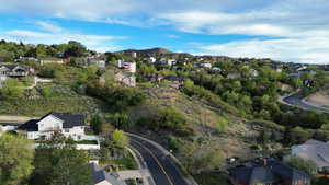 Aerial perspective of suburban area with mountains