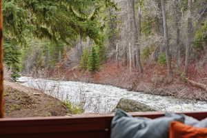 View of local wilderness featuring a nearby body of water