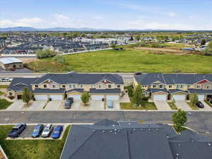 Aerial view of residential area featuring a mountain backdrop