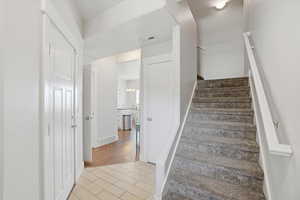 Stairway with wood finished floors