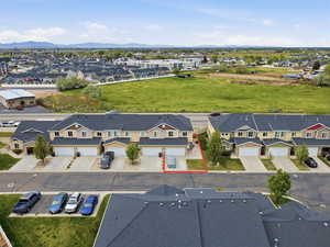 Aerial perspective of suburban area featuring mountains