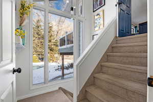 2nd stair case leading to garage and mud room
