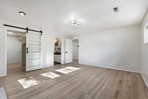 Basement master facing walk in closet and bathroom