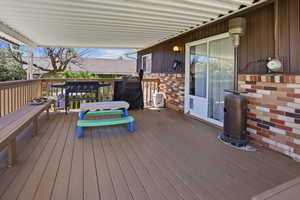 Deck featuring a grill