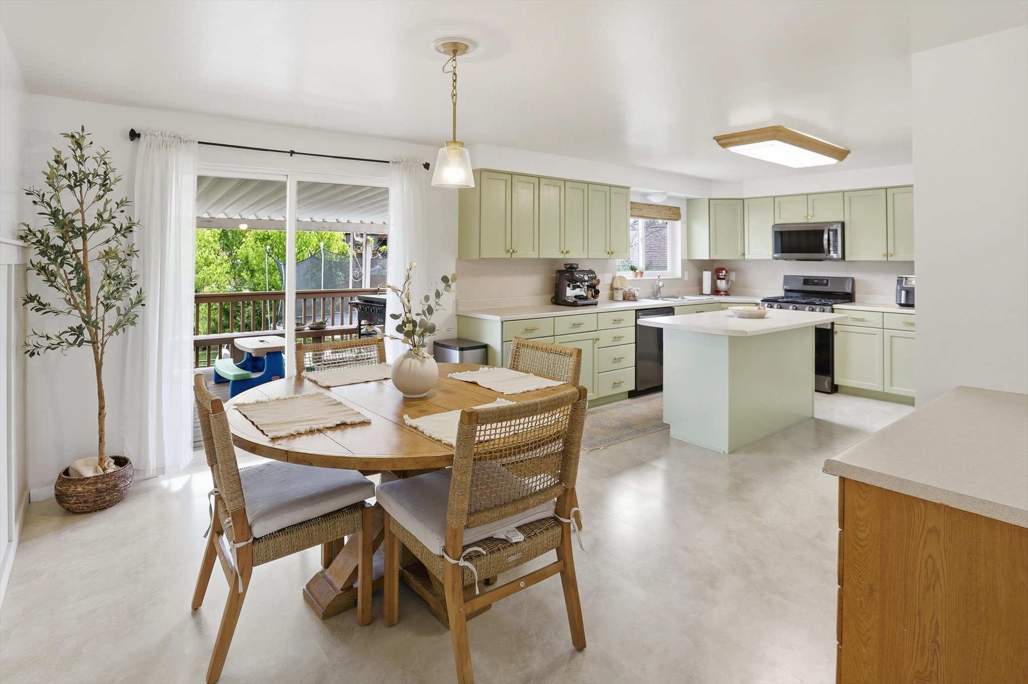 Dining space with finished concrete flooring
