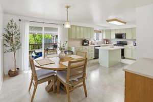 Dining space with finished concrete flooring