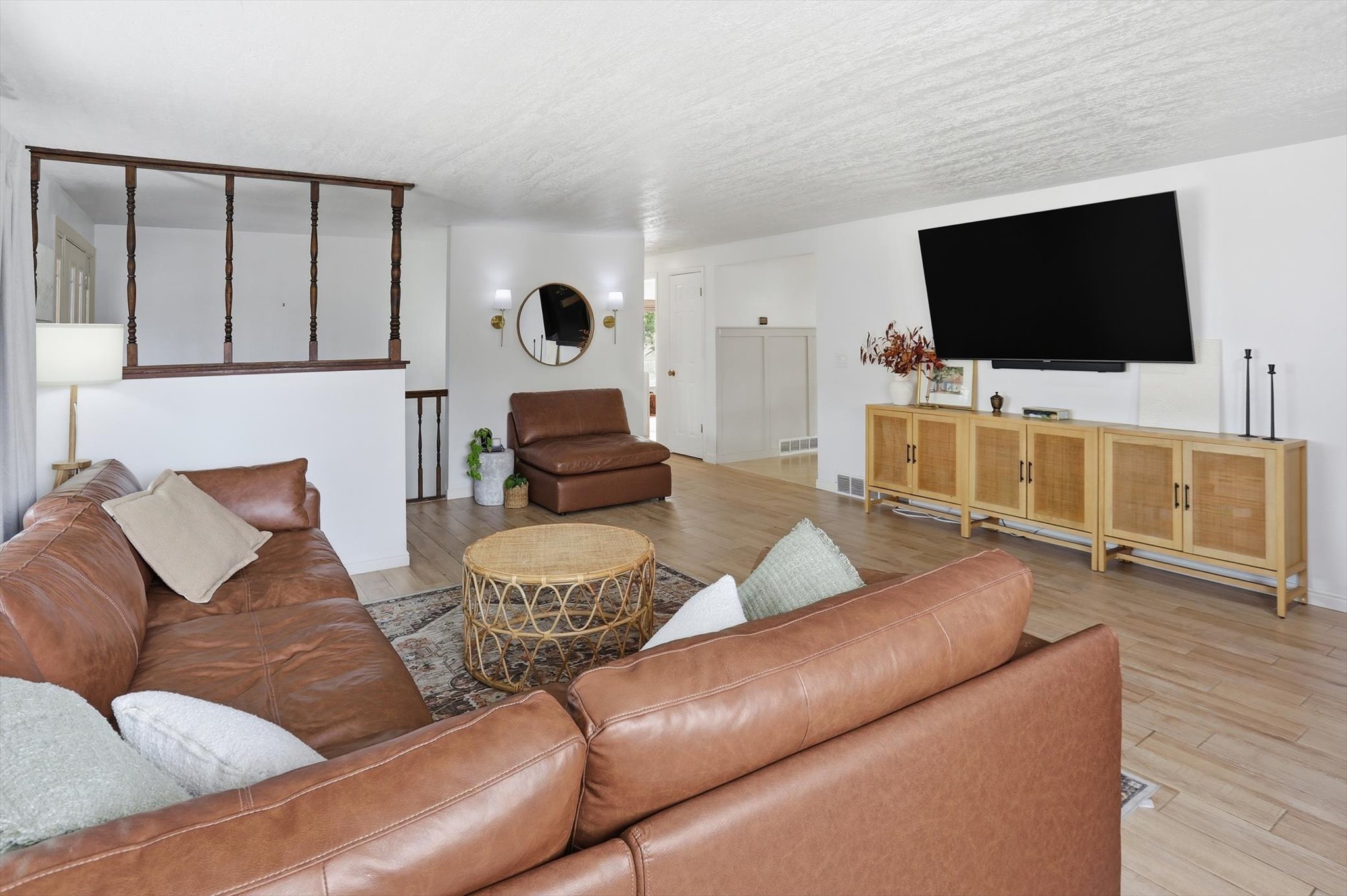 Living area with light wood-style flooring