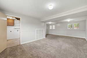 Spacious basement area with additional storage and access to utility and mechanical spaces.