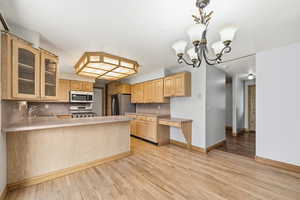 Functional kitchen layout with plenty of counter space, storage, and easy flow into the main living areas.