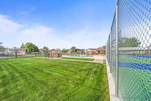 Community amenities including pool and gathering areas within close proximity.