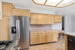 Generous kitchen storage with extended cabinetry and ample counter space, perfect for everyday living and entertaining.