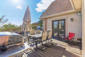 Wooden terrace with outdoor dining area