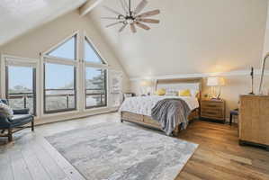 Bedroom featuring ceiling fan, light wood-style flooring, and access to outside